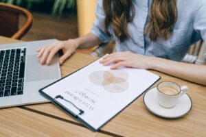 A brand awareness strategist with a clipboard