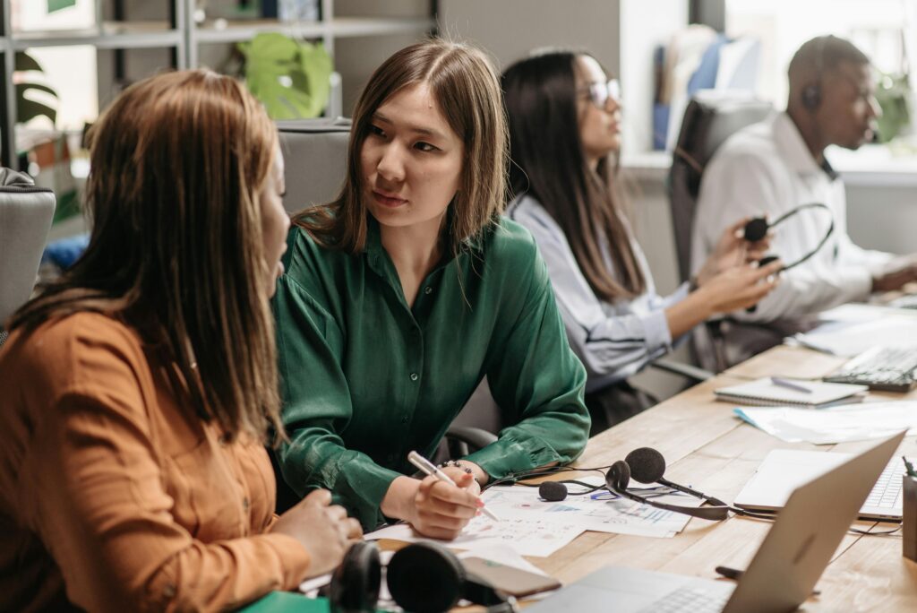 Entry-level marketing professionals working together